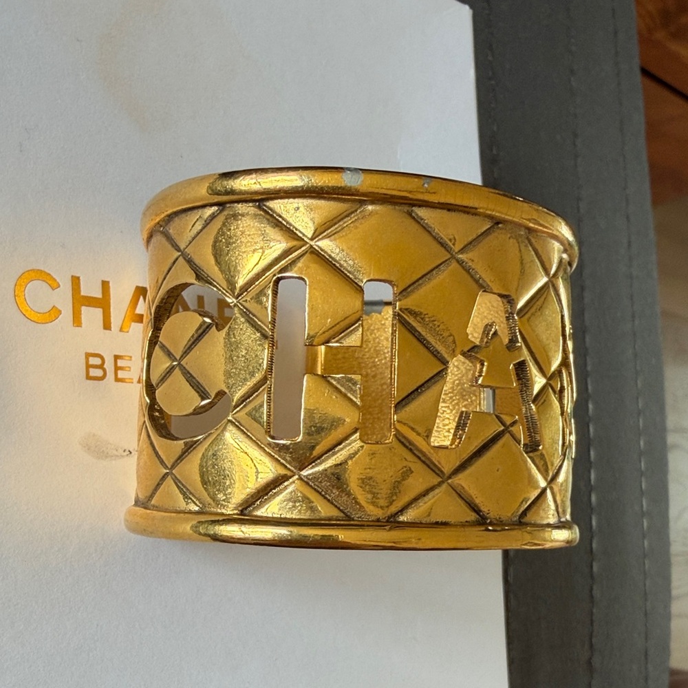 Chanel vintage gold cut out Logo Cuff